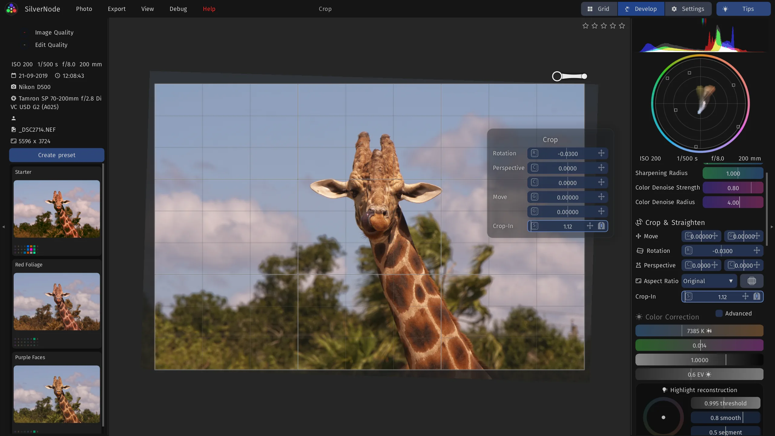 Straightening and cropping in on a giraffe against a cloudy sky, with the crop sliders next to the mouse.